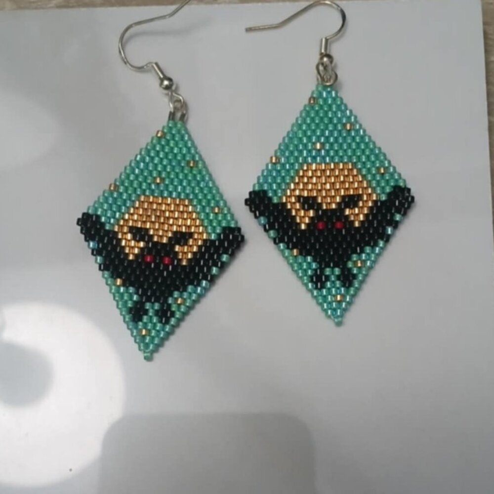 Handmade indigenous beadwork - mothman